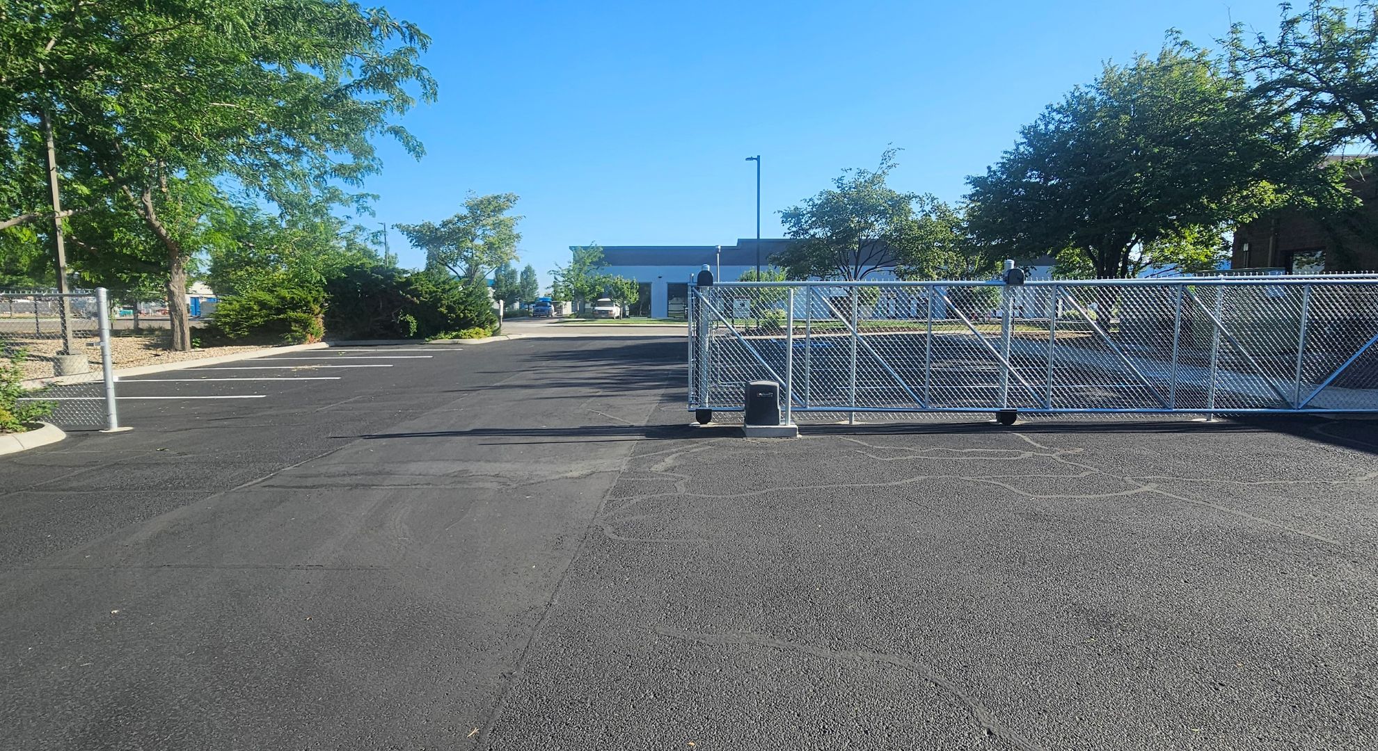 2 A sliding chain link fence in front of a Boise business